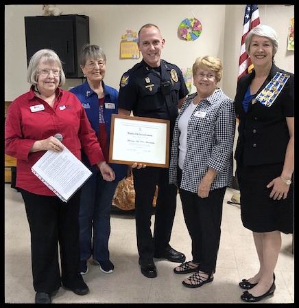 Awarding the DAR Distinguished Citizen Award to Lieutenant Thomas VanDorn, Phoenix Police Commander, Black Mountain Precinct.